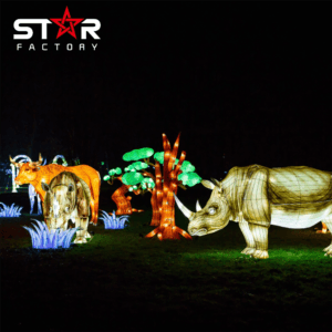 Rhino lantern displayed with other animal lanterns in a night scene