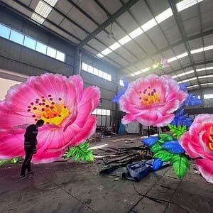 Group of giant pink peony lanterns arranged in the workshop
